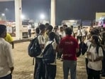 **EDS: THIRD PARTY IMAGE** In this screengrab from a video received on Oct. 15, 2025, stranded students wait at a petrol pump amid a traffic jam on the Mumbai-Ahmedabad National Highway at Vasai, in Palghar district, Maharashtra. (Social Media Screengrab via PTI Photo) (PTI10_15_2025_000206B) (PTI) **EDS: THIRD PARTY IMAGE** In this screengrab from a video received on Oct. 15, 2025, stranded students wait at a petrol pump amid a traffic jam on the Mumbai-Ahmedabad National Highway at Vasai, in Palghar district, Maharashtra. (Social Media Screengrab via PTI Photo) (PTI10_15_2025_000206B) (PTI)