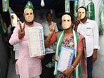 JDU supporters wearing Nitish's masks holding dummy of Electronic Voting Machines (EVMs) ahead of Bihar Assembly Election 2025.