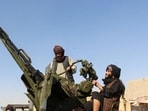 An Afghan Taliban fighter sit next to an anti-aircraft gun near the Afghanistan-Pakistan border in Spin Boldak, Kandahar Province, following exchanges of fire between Pakistani and Afghan forces, on October 15 (REUTERS) An Afghan Taliban fighter sit next to an anti-aircraft gun near the Afghanistan-Pakistan border in Spin Boldak, Kandahar Province, following exchanges of fire between Pakistani and Afghan forces, on October 15 (REUTERS)