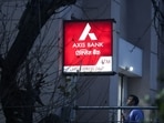 A man enters a branch of Axis Bank in New Delhi, India.