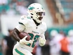 De'Von Achane #28 of the Miami Dolphins runs against the Los Angeles Chargers 