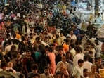 People throng a market place for Diwali festival shopping in Mumbai (AP)