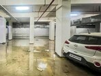 The explosion at Triveni Heights, located in Sector 16B, was reported around 7.15pm on October 5, leaving several cars and portions of the basement severely damaged. (HT Photo)