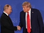 FILE - President Donald Trump, right, shakes the hand of Russia's President Vladimir Putin during a joint press conference at Joint Base Elmendorf-Richardson, Alaska, Aug. 15, 2025.