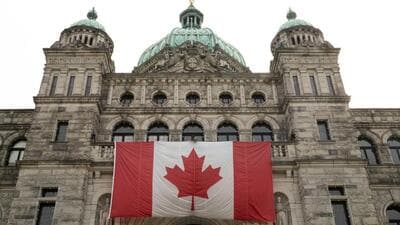 A Canadian flag adorns British Columbia's provincial legislature building in Victoria, British Columbia, Canada (Photograph for representative purpose only) (REUTERS) A Canadian flag adorns British Columbia's provincial legislature building in Victoria, British Columbia, Canada (Photograph for representative purpose only) (REUTERS)