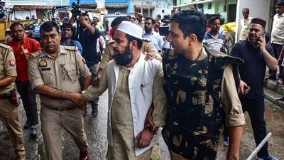 Earlier, police personnel arrested Mohsin Raza, a relative of the arrested cleric Maulana Tauqeer Raza Khan, in connection with the recent violence in Bareilly. (PTI) Earlier, police personnel arrested Mohsin Raza, a relative of the arrested cleric Maulana Tauqeer Raza Khan, in connection with the recent violence in Bareilly. (PTI)