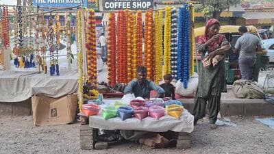 From diyas once selling at ₹40 a hundred to just ₹120 now, traditional vendors like Mehandi say their earnings haven’t kept pace with rising costs. (HT Photo) From diyas once selling at ₹40 a hundred to just ₹120 now, traditional vendors like Mehandi say their earnings haven’t kept pace with rising costs. (HT Photo)