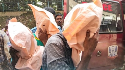 Police officials arrest men allegedly involved in the gang rape of a second-year MBBS student at a private medical college in Durgapur, West Bengal. (PTI) Police officials arrest men allegedly involved in the gang rape of a second-year MBBS student at a private medical college in Durgapur, West Bengal. (PTI)