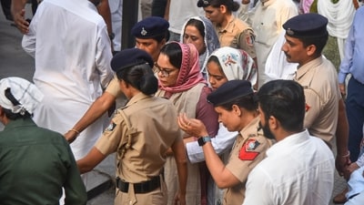 Chandigarh: Amneet P Kumar, the wife of deceased Haryana IPS officer Y Puran Kumar, during latter's last rites. (PTI) Chandigarh: Amneet P Kumar, the wife of deceased Haryana IPS officer Y Puran Kumar, during latter's last rites. (PTI)