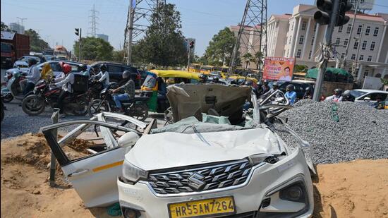 The mangled car at the accident spot in Gurugram on Thursday. (Parveen Kumar/HT)