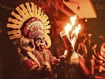 Theyyam combines ancestor worship, fertility rites and myth, and is believed to have originated among indigenous tribes in the Malabar region of present-day Kerala. (Adobe Stock) Theyyam combines ancestor worship, fertility rites and myth, and is believed to have originated among indigenous tribes in the Malabar region of present-day Kerala. (Adobe Stock)