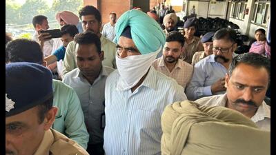 DIG Punjab Harcharan Singh Bhullar in district court Sector 43 in Chandigarh on Friday (HT Photo) DIG Punjab Harcharan Singh Bhullar in district court Sector 43 in Chandigarh on Friday (HT Photo)