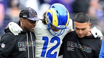 Puka Nacua of the Los Angeles Rams is helped off the field after suffering an injury. (Getty Images via AFP) Puka Nacua of the Los Angeles Rams is helped off the field after suffering an injury. (Getty Images via AFP)