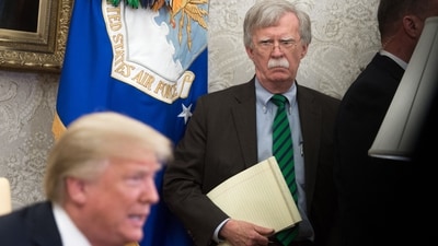 John Bolton stands alongside US President Donald Trump as he speaks in 2018 (AFP) John Bolton stands alongside US President Donald Trump as he speaks in 2018 (AFP)