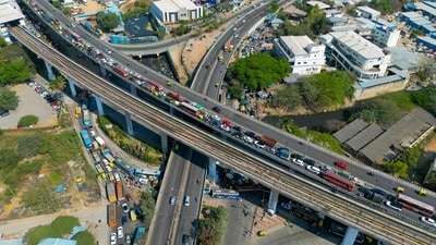 Once meant to ease traffic between IT hubs, Bengaluru’s Outer Ring Road has become one of the city’s most gridlocked stretches, highlighting the need for urban planning, experts said. (Representational Image) (Photo by Idrees MOHAMMED / AFP) (Photo by Idrees MOHAMMED / AFP) Once meant to ease traffic between IT hubs, Bengaluru’s Outer Ring Road has become one of the city’s most gridlocked stretches, highlighting the need for urban planning, experts said. (Representational Image) (Photo by Idrees MOHAMMED / AFP) (Photo by Idrees MOHAMMED / AFP)