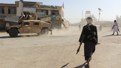 Afghan Taliban fighters patrol near the Afghanistan-Pakistan border in Spin Boldak, Kandahar Province, following exchanges of fire between Pakistani and Afghan forces in Afghanistan. (REUTERS)