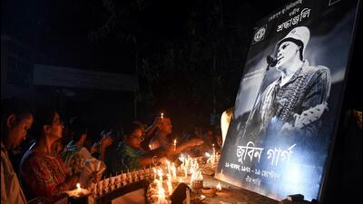 People light candles and pay their respects at a memorial for late singer Zubeen Garg, in Tezpur, Assam. (ANI)