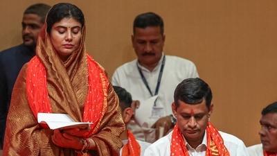 Gandhinagar: MLA Rivaba Jadeja, wife of cricketer Ravindra Jadeja, takes oath during the swearing-in ceremony of the new Gujarat cabinet, in Gandhinagar, Gujarat, Friday, Oct. 17, 2025. (PTI) Gandhinagar: MLA Rivaba Jadeja, wife of cricketer Ravindra Jadeja, takes oath during the swearing-in ceremony of the new Gujarat cabinet, in Gandhinagar, Gujarat, Friday, Oct. 17, 2025. (PTI)