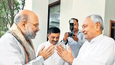 Union Home Minister Amit Shah meets Bihar Chief Minister Nitish Kumar at his residence, in Patna on Friday. (ANI) Union Home Minister Amit Shah meets Bihar Chief Minister Nitish Kumar at his residence, in Patna on Friday. (ANI)