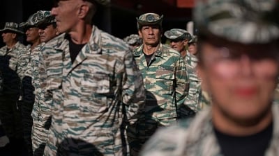 Members of a Venezuelan militia group stand in formation during a training last week in Caracas.
