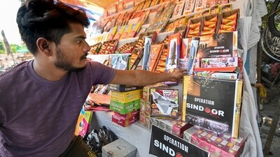 A shopkeeper arranges firecrackers named 'Operation Sindoor' and 'BrahMos' ahead of Diwali celebrations, in Prayagraj, Uttar Pradesh, Friday, Oct. 17, 2025. (PTI) A shopkeeper arranges firecrackers named 'Operation Sindoor' and 'BrahMos' ahead of Diwali celebrations, in Prayagraj, Uttar Pradesh, Friday, Oct. 17, 2025. (PTI)