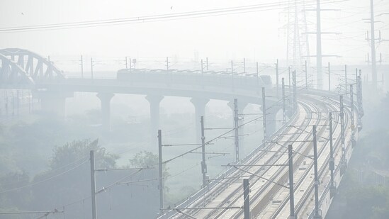 Thick smog blankets Ghaziabad as pollution levels rise across Delhi-NCR. Morning visibility dropped significantly in the Hindon area amid worsening air quality(Sakib Ali / Hindustan Times)