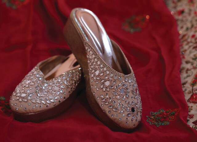 Bejewelled sneakers, embroidered juttis and zardozi-covered wedges are trendy and easy on the feet. (ADOBE STOCK) Bejewelled sneakers, embroidered juttis and zardozi-covered wedges are trendy and easy on the feet. (ADOBE STOCK)