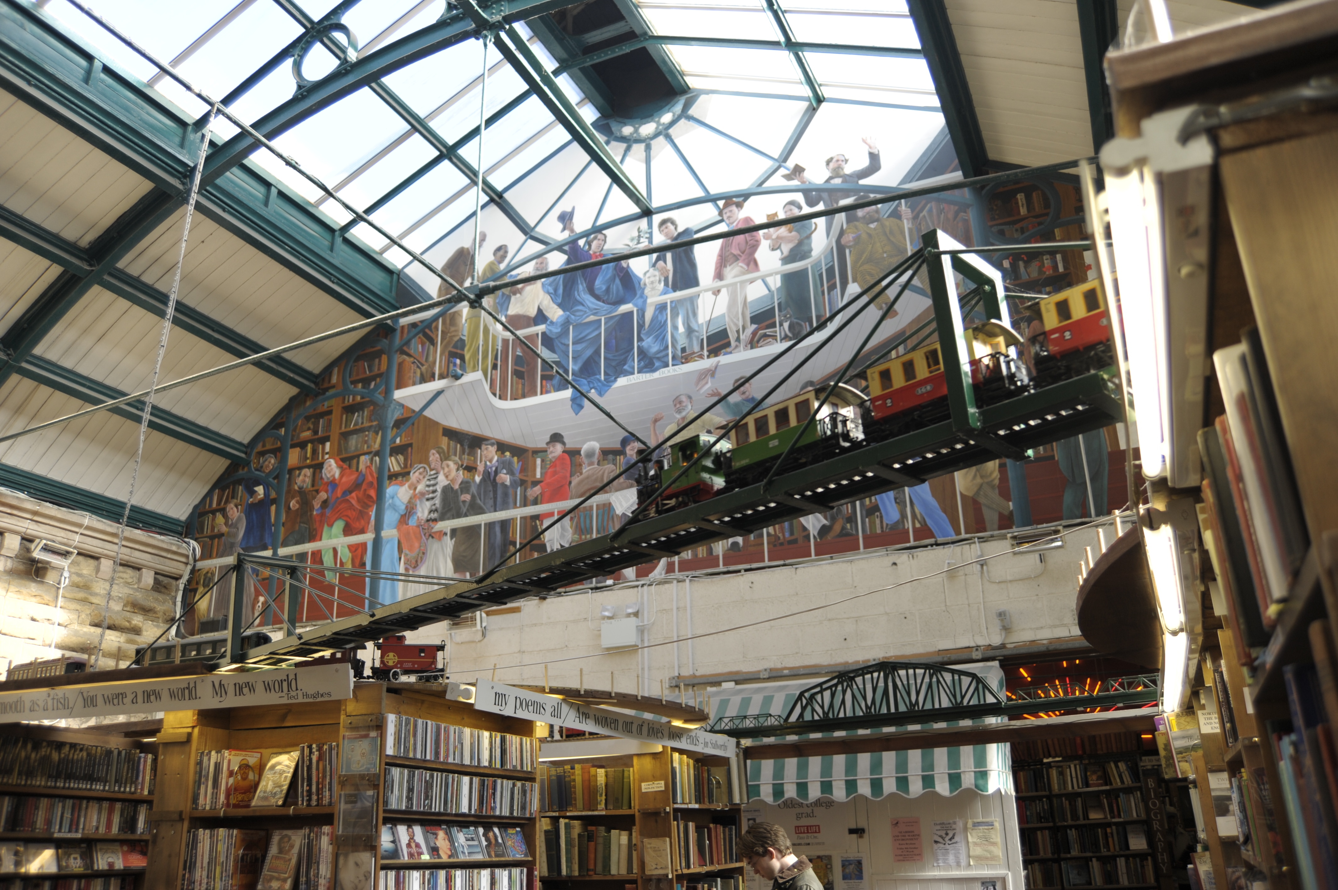 The arched halls are packed with book shelves, a model railway running overhead, murals of writers, armchairs by open fires, and a café that serves tea and scones. (Courtesy Barter Books) The arched halls are packed with book shelves, a model railway running overhead, murals of writers, armchairs by open fires, and a café that serves tea and scones. (Courtesy Barter Books)
