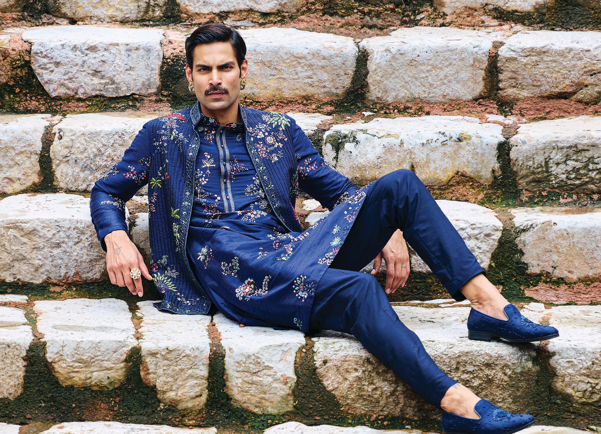 Men are going all out with clashing colours and jewellery, as well as funky brooches, say designers. (ASUKA COUTURE) Men are going all out with clashing colours and jewellery, as well as funky brooches, say designers. (ASUKA COUTURE)