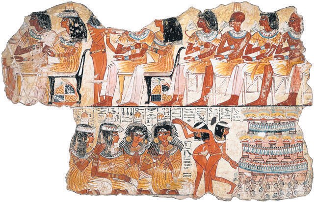 Musicians and dancers accompany a procession carrying an idol of Amun-Re, Ancient Egypt’s king of Gods, from Karnak to Luxor, in a recreation of a temple carving. Musicians and dancers accompany a procession carrying an idol of Amun-Re, Ancient Egypt’s king of Gods, from Karnak to Luxor, in a recreation of a temple carving.