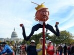 Demonstrators hold an effigy depicting U.S. President Donald Trump during a "No Kings" protest 