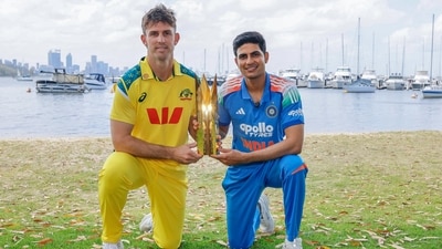 Indian skipper Shubman Gill and Australian skipper Mitchell Marsh pose for a picture with the trophy. (@BCCI X) Indian skipper Shubman Gill and Australian skipper Mitchell Marsh pose for a picture with the trophy. (@BCCI X)