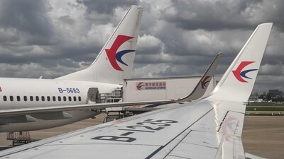 China Eastern Airlines Boeing 737-800 aircrafts are seen parked at Shanghai Hongqiao International Airport in Shanghai on July 22, 2025. (Photo by Hector RETAMAL / AFP) (AFP) China Eastern Airlines Boeing 737-800 aircrafts are seen parked at Shanghai Hongqiao International Airport in Shanghai on July 22, 2025. (Photo by Hector RETAMAL / AFP) (AFP)