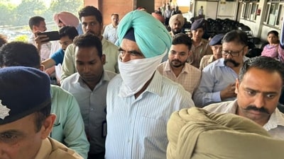 DIG Punjab Harcharan Singh Bhullar in district court Sector 43 in Chandigarh on Friday. (HT_PRINT)