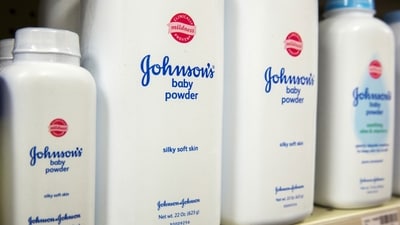 Bottles of Johnson & Johnson baby powder line a drugstore shelf in New York October 15, 2015. (REUTERS)