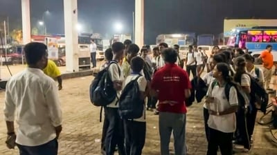 Stranded students wait at a petrol pump amid a traffic jam on the Mumbai-Ahmedabad National Highway at Vasai, in Palghar district, Maharashtra. (PTI) Stranded students wait at a petrol pump amid a traffic jam on the Mumbai-Ahmedabad National Highway at Vasai, in Palghar district, Maharashtra. (PTI)