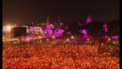People perform ‘aarti’ on the banks of the Saryu river ahead of the ‘Deepotsav’ at a ghat, in Ayodhya, Saturday. (PTI Photo) People perform ‘aarti’ on the banks of the Saryu river ahead of the ‘Deepotsav’ at a ghat, in Ayodhya, Saturday. (PTI Photo)