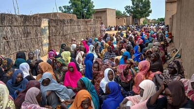 Sudanese residents gather to receive meals in Al Fasher. (AFP) Sudanese residents gather to receive meals in Al Fasher. (AFP)