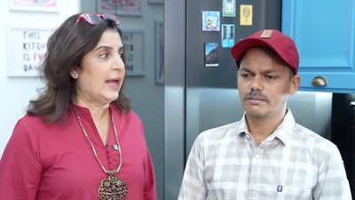 Farah Khan's cook Dilip, thrilled with a salary hike, tries to conceal his happiness.