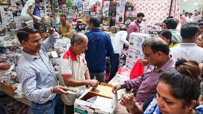People thronged utensils shop in Delhi's Sarojini Nagar market on the auspicious occasion of Dhanteras on Saturday. (ANI )