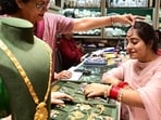 About 42 kg gold worth <span class='webrupee'>₹</span>55.61 crore was sold in the market during the day, which was less than 52kg gold worth <span class='webrupee'>₹</span>42.12 crore last Dhanteras (HT Photo) About 42 kg gold worth <span class='webrupee'>₹</span>55.61 crore was sold in the market during the day, which was less than 52kg gold worth <span class='webrupee'>₹</span>42.12 crore last Dhanteras (HT Photo)
