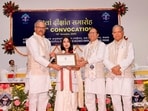 DCGI Dr Rajeev Singh Raghuvanshi (extreme left) along with NIPER director Dulal Panda (2R) and guest of honour Yugal Sikri confer degree upon a graduate on Saturday. (HT Photo) DCGI Dr Rajeev Singh Raghuvanshi (extreme left) along with NIPER director Dulal Panda (2R) and guest of honour Yugal Sikri confer degree upon a graduate on Saturday. (HT Photo)