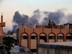 Smoke rises following an Israeli airstrike in Khan Younis, southern Gaza Strip, October 19, 2025.