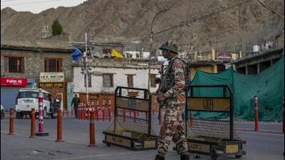 A security officer in Leh after curfew was imposed following the violence last month. (PTI) A security officer in Leh after curfew was imposed following the violence last month. (PTI)