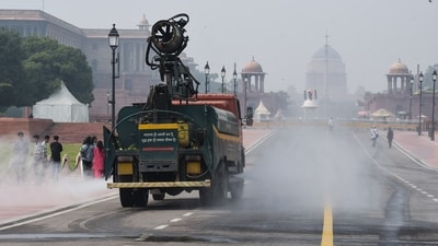 Smog Gun sprays water to control pollution levels as Air Quality dropped to poor category near Rashtrapati Bhawan, in New Delhi on Sunday. (ANI Photo/ Sumit) (Sumit)