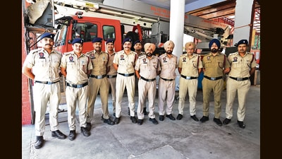 Deepak Kumar (2nd from left) along with a team of fire and rescue officers at the Sector-17 fire station. (Keshav Singh/HT) Deepak Kumar (2nd from left) along with a team of fire and rescue officers at the Sector-17 fire station. (Keshav Singh/HT)