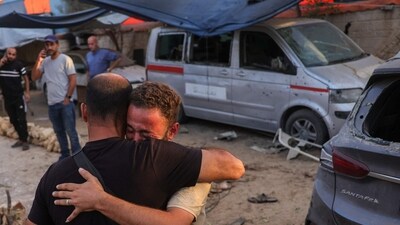 Members of the press mourn following an Israeli strike that reportedly struck a house used by journalists in the Al-Zawayda city near Deir al-Balah, in the central Gaza on October 19, 2025. (AFP) Members of the press mourn following an Israeli strike that reportedly struck a house used by journalists in the Al-Zawayda city near Deir al-Balah, in the central Gaza on October 19, 2025. (AFP)