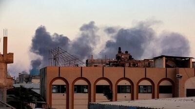 Smoke rises following an Israeli airstrike in Khan Younis, southern Gaza Strip, October 19, 2025. (Reuters)