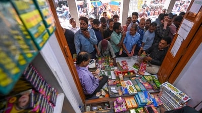 People buying green crackers as they go on sale in Delhi's Chandni Chowk in New Delhi, India, on Saturday, October 18, 2025. (Sanchit Khanna/HT Photo) People buying green crackers as they go on sale in Delhi's Chandni Chowk in New Delhi, India, on Saturday, October 18, 2025. (Sanchit Khanna/HT Photo)