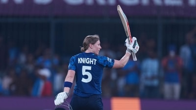 Heather Knight celebrates her century during the ICC Women's Cricket World Cup match between India and England. (AP) Heather Knight celebrates her century during the ICC Women's Cricket World Cup match between India and England. (AP)